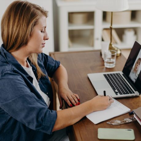 woman working on a laptop at a table